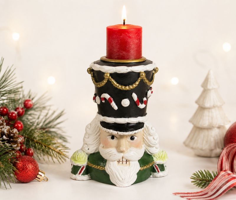 Bougeoir Noël résine tête de casse-noisette vert et noir détails dorés regard malicieux H9cm - Lilosquare
