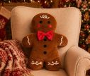 Voir la slide Coussin Noël velours brun chocolat forme bonhomme pain d'épices garçon nœud papillon rouge boutons noirs joues rouges H47cm