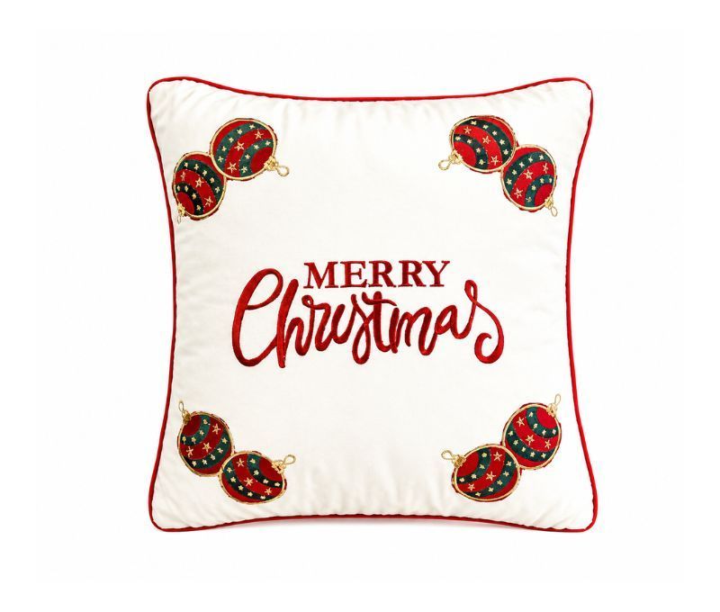 Coussin de Noël velours blanc inscription Merry Christmas rouge quatre paires boules rouge vert or brodées liseré rouge 45x45cm