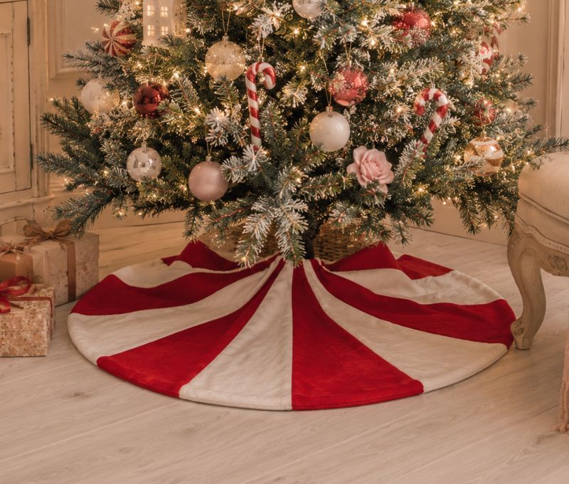 Tapis de sapin de Noël rond rouge et blanc rayures tourbillonnantes façon bonbon D90cm - Lilosquare