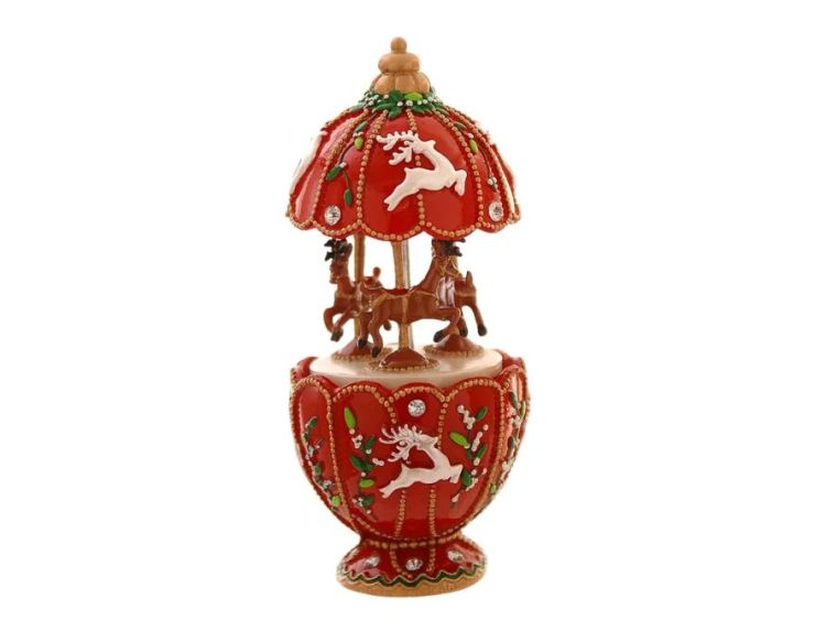 Boîte à musique de Noël rouge H17cm avec 3 rennes tournants, motifs houx et cabochons