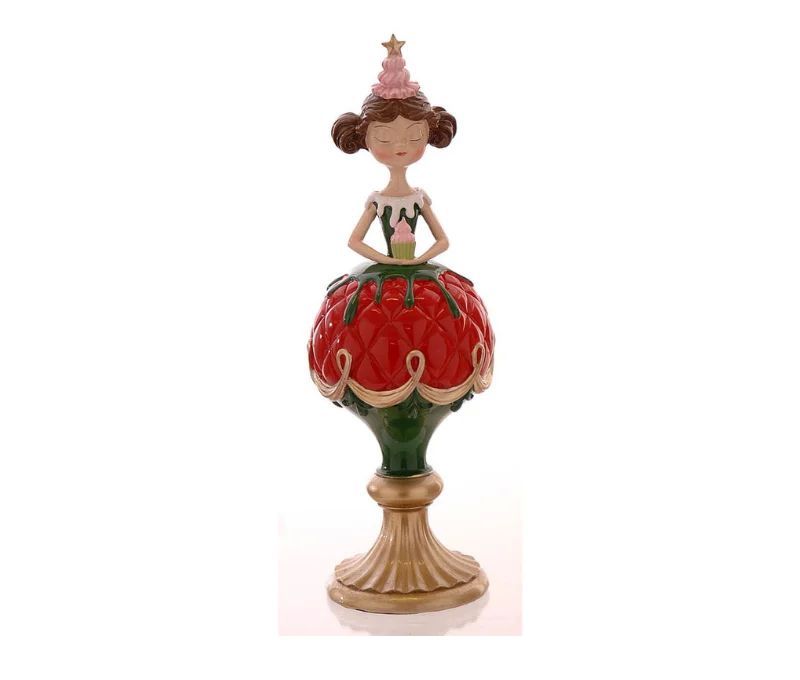 Figurine Noël résine brillante fille jupe boule rouge vert pied doré chapeau rose étoile dorée tenant un cupcake H32,5cm