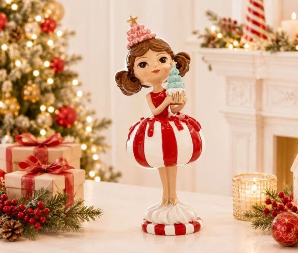 Figurine Noël résine fille robe boule rayée rouge blanc jupe volumineuse tenant un cupcake bleu chapeau rose étoile dorée H25cm