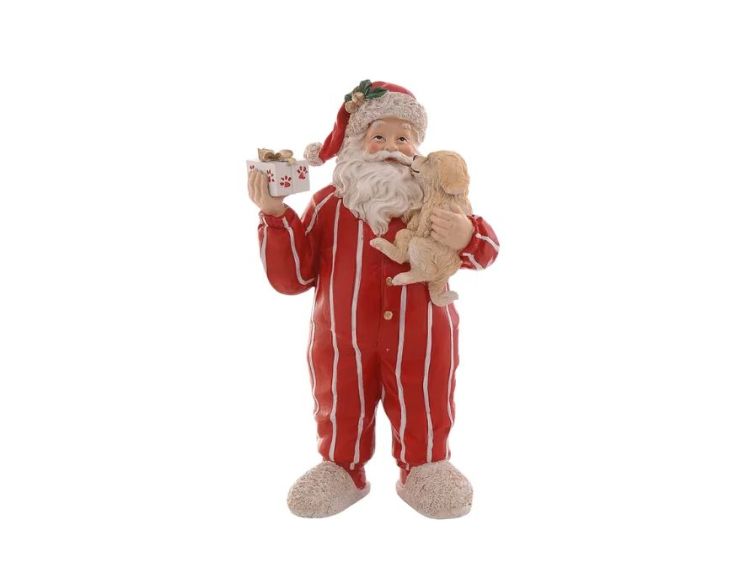 Figurine Noël résine Père Noël pyjama rayé rouge blanc tenant chiot beige et cadeau emballé pattes H30cm