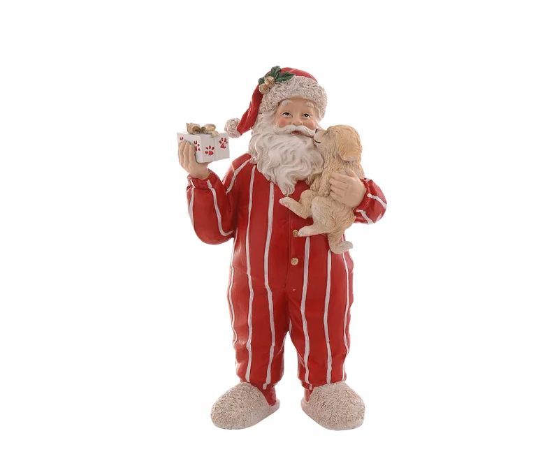 Figurine Noël résine Père Noël pyjama rayé rouge blanc tenant chiot beige et cadeau emballé pattes H30cm