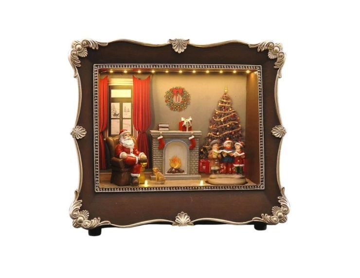 Boîte à musique cadre de Noël en résine H23cm, scène LED Père Noël au coin du feu, enfants autour du sapin, cadre brun et argent