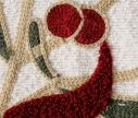 Voir la slide Coussin carré 45x45cm en bouclette ivoire, branche de gui brodée vert et rouge, gros nœud rouge