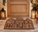 Voir la slide Paillasson Noël 60x40cm en fibre de coco, motif 3 maisons pain d’épices blanc sur fond brun naturel