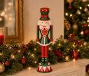 Voir la slide Figurine casse-noisette H40cm, uniforme vert et rouge, chapeau vert pointes dorées, socle tambour multicolore