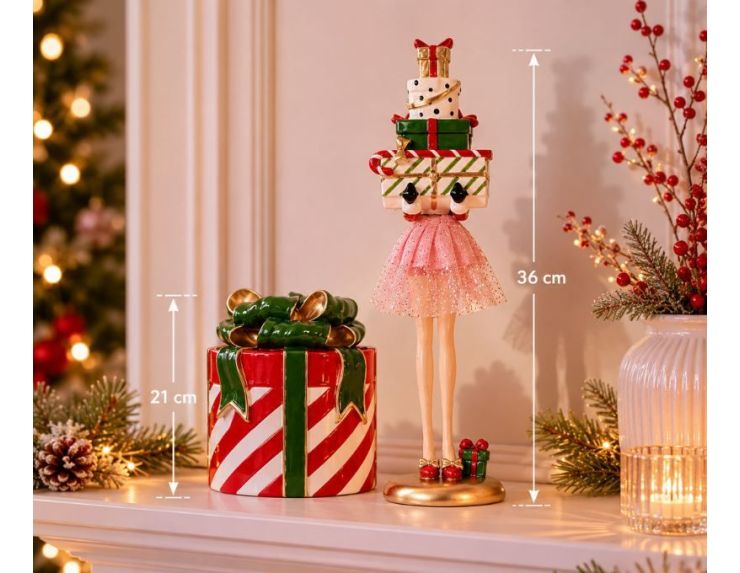 Figurine fille H36cm jupe rose scintillante, souliers rouges, pile de cadeaux Noël colorés sur la tête