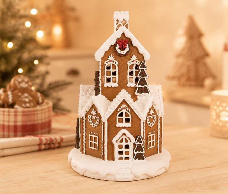 Maison pain d'épices LED polyrésine brune glaçage blanc sapins couronne houx H32cm