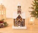 Voir la slide Maison pain d'épices LED chapelle brune glaçage blanc couronne houx toit enneigé H25cm