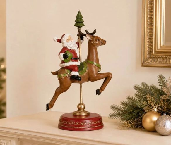Figurine Père Noël sur renne carrousel vintage résine peinte main base rouge dorée H30cm