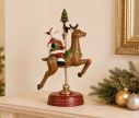 Voir la slide Figurine Père Noël sur renne carrousel vintage résine peinte main base rouge dorée H30cm