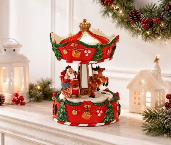 Boîte à musique carrousel Noël poly rouge Père Noël traîneau renne guirlandes sapins cloches dorées mouvement rotatif H17cm