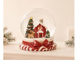 Boule à neige poly verre maison rouge enneigée sapins étoile dorée renne socle sucres orge nœud rouge Noël H11cm