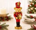 Voir la slide Figurine ourson casse-noisette poly rouge doré uniforme tambour doré chapeau plume rouge socle doré Noël H16cm