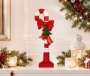 Voir la slide Décoration Noël canne sucre d'orge rouge nœud houx socle rouge H39cm