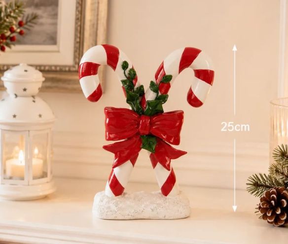 Décoration Noël deux cannes sucre d'orge rouge nœud houx socle neige H25cm