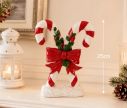 Voir la slide Décoration Noël deux cannes sucre d'orge rouge nœud houx socle neige H25cm