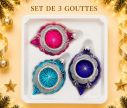 Voir la slide Coffret 3 gouttes de Noël verre fuchsia turquoise indigo bordure pailletée argentée  Ø7cm