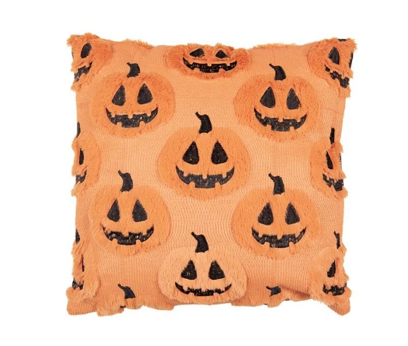 Coussin orange texturé citrouilles Halloween visages souriants brodés noir franges L45 x l45cm