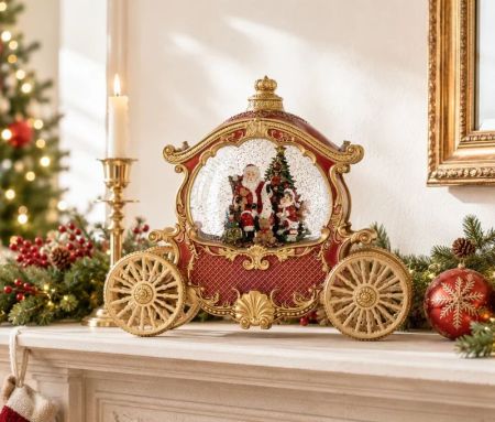 Décoration de Noël carrosse rouge doré boule à neige lumineuse Père Noël roues dorées L26xl11xH20cm