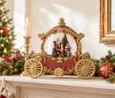 Voir la slide Décoration de Noël carrosse rouge doré boule à neige lumineuse Père Noël roues dorées L26xl11xH20cm
