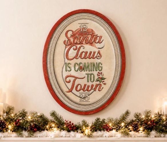 Plaque métal ovale rouge blanc Santa Claus is coming to town sucre d'orge houx H62xL47xl2cm