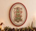 Voir la slide Plaque métal ovale rouge blanc Have a Holly Jolly Christmas sapin houx H62xL47xl2cm