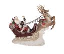 Voir la slide Décoration de Noël Père Noël traîneau rouge doré deux rennes cadeaux socle neigeux L42xl14xH36cm