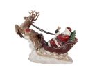 Voir la slide Décoration de Noël Père Noël traîneau rouge doré deux rennes cadeaux socle neigeux L42xl14xH36cm