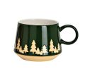 Voir la slide Tasse de Noël en faïence verte silhouettes de sapins dorés base brute anse verte intérieur blanc 440ml