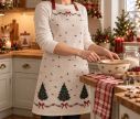 Voir la slide Tablier cuisine Noël beige sapins nœuds rouges houx 70x85cm