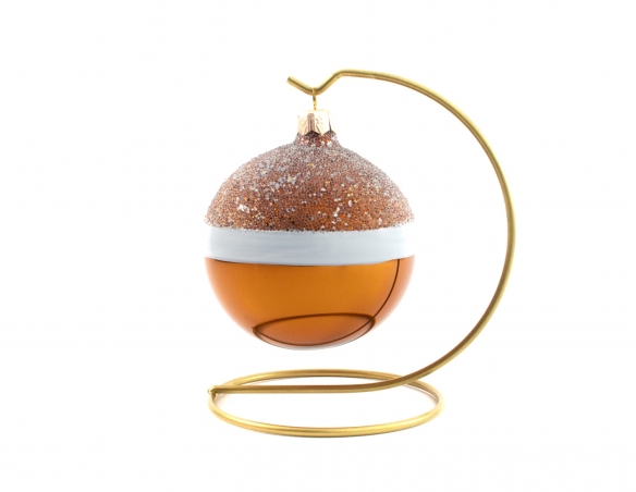 Boule de Noël cuivrée avec une ligne blanche au milieu et des paillettes  sur le haut de la boule. Diamètre 8 cm