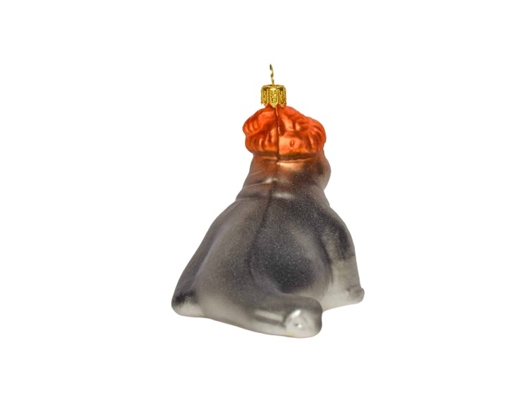 Boule de Noël en verre soufflé décoré main forme de phoque avec bonnet orange. vue de dos