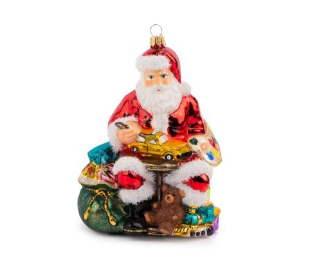 Décoration Père Noël en verre soufflé avec des jouets et un sac rempli de cadeaux. Hauteur 18cm. Marque Lilosquare