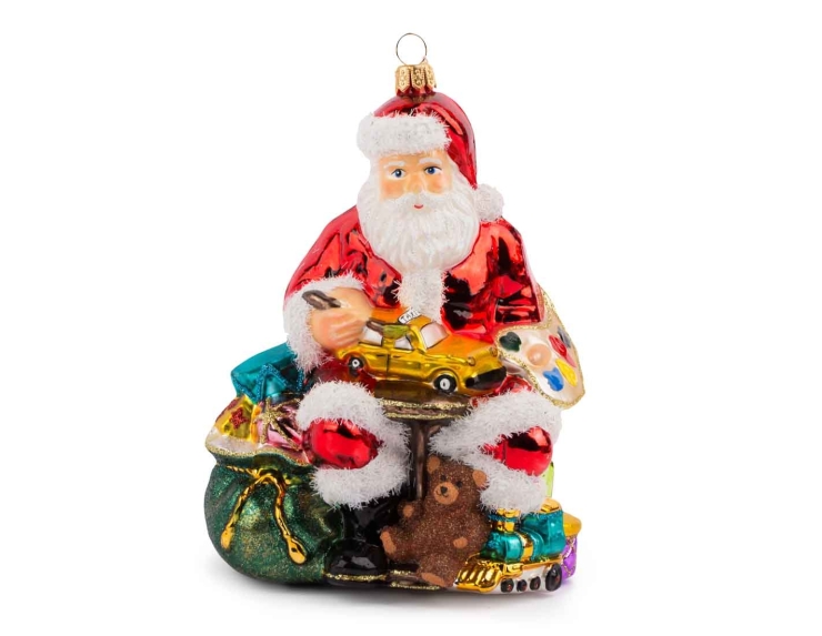 Décoration Père Noël en verre soufflé avec des jouets et un sac rempli de cadeaux. Hauteur 18cm. Marque Lilosquare