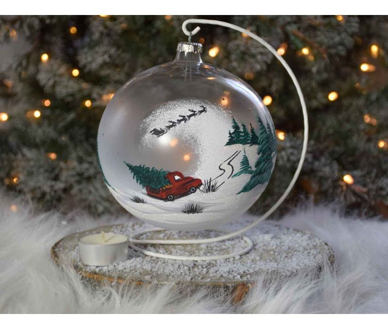 bougeoir de Noël verre soufflé transparent avec décor camion rouge transportant un sapin de Noël et traineau du Père Noël