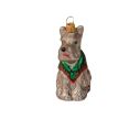 See slide Suspension de Noël chien fox terrier gris avec son petit manteau d'hiver rouge et vert. Hauteur 10cm.