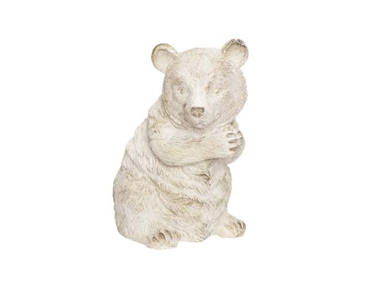 Petite figurine ours blanc en résine pour votre décoration d'intérieur. Hauteur 14cm.