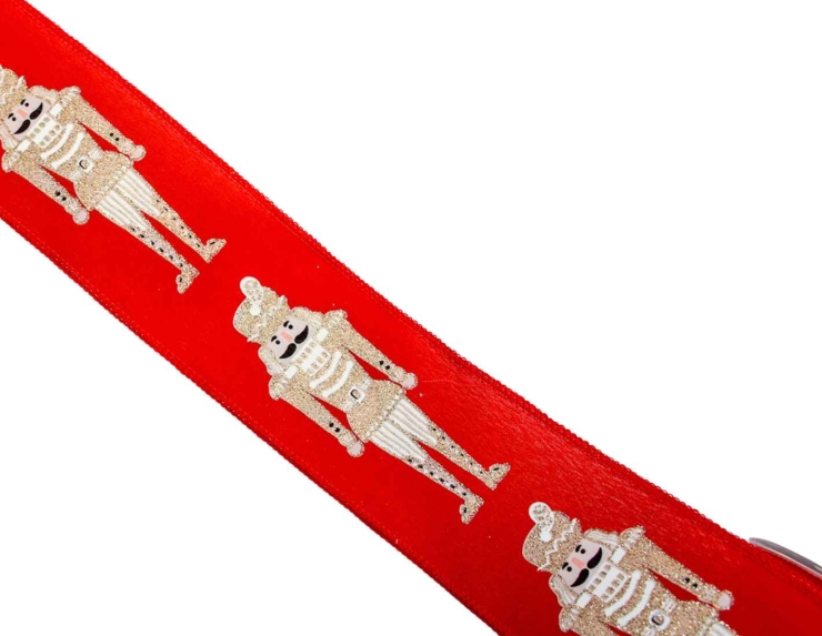 Large ruban de Noël rouge décor casse-noisette doré.

Fil de fer intégré dans le bord pour le manier facilement.