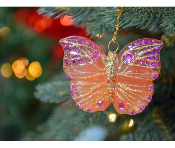 Boule de Noël papillon rose et orange en verre soufflé, strass et paillettes roses. Hauteur de 6cm, made in Europe.