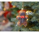 See slide Boule de Noël bonhomme en pain d'épices avec noeud papillon rouge, verre soufflé et décoré à la main.