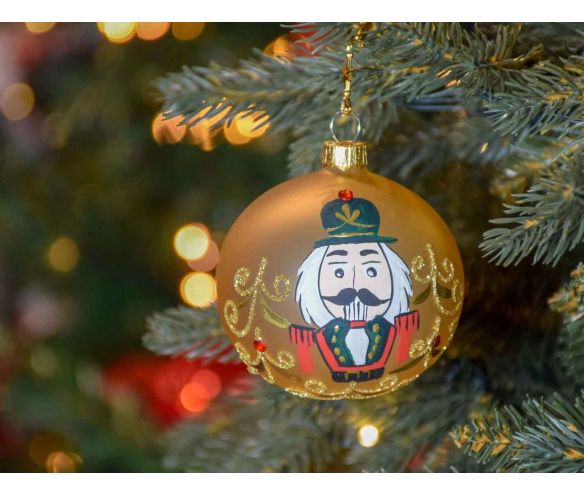 Boule de Noël dorée en verre avec casse-noisette peint à la main. boule de Noël de luxe, made in Europe. Diamètre : 8cm