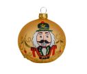 Voir la slide Boule de Noël dorée en verre avec casse-noisette peint à la main. boule de Noël de luxe, made in Europe. Diamètre : 8cm