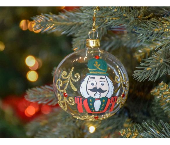 Boule de Noël transparente en verre, décor de casse-noisette entièrement peint à la main.