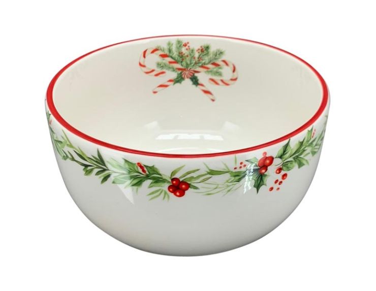 Grand bol en porcelaine avec décors de sucres d'orge et houx sur le contour du bol. Diamètre : 18cm