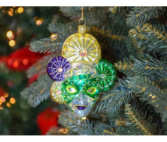 Boule de Noël artisanale en verre soufflé masque vénitien vert, jaune et mauve.

Hauteur : 15cm