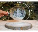 See slide Grande boule de Noël photophore en verre soufflé décor renne avec couronne de Noël.
